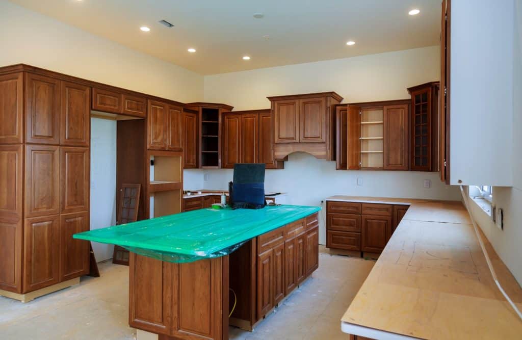 Kitchen cabinets installation Blind corner cabinet, island drawers and counter cabinets installed