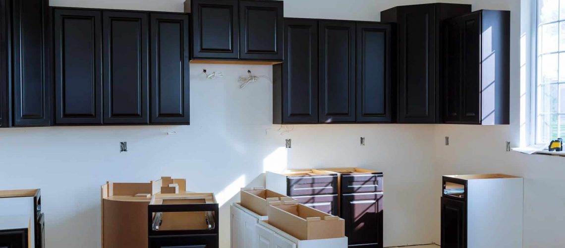 Kitchen cabinets installation Blind corner cabinet, island drawers and counter cabinets installed